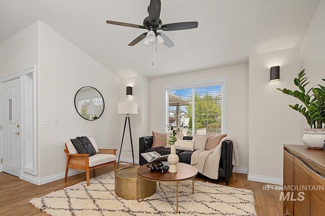 8613 W Thunder Mountain Dr, Boise, ID 83709 - living area featuring lofted ceiling, wood finished floors, a ceiling fan, and baseboards