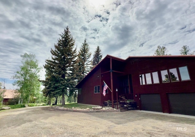 14060 Deerfield, Mccall, ID 83638 - view of front of house featuring an attached garage