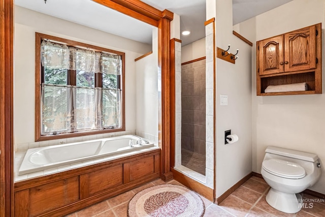 14060 Deerfield, Mccall, ID 83638 - bathroom with toilet, a garden tub, tile patterned flooring, and tiled shower