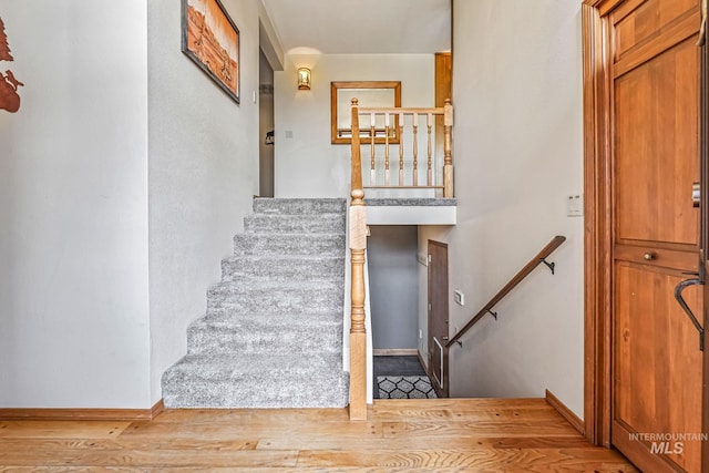 14060 Deerfield, Mccall, ID 83638 - staircase with wood finished floors and baseboards