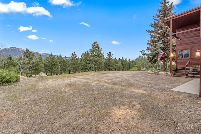 14060 Deerfield, Mccall, ID 83638 - view of yard with a view of trees and a mountain view