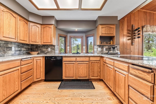 14060 Deerfield, Mccall, ID 83638 - kitchen featuring black appliances, a sink, light wood-style flooring, and healthy amount of natural light
