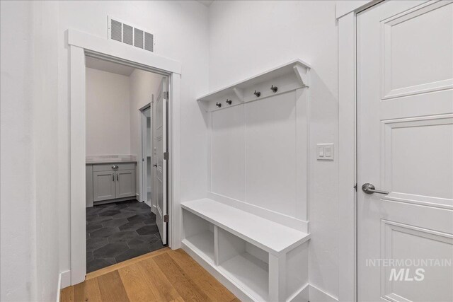 mudroom featuring light tile patterned flooring