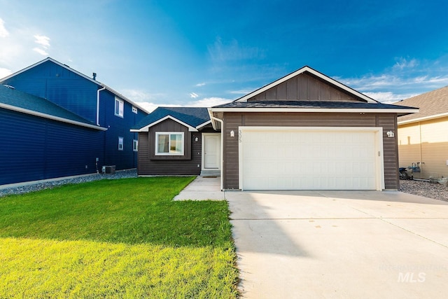 ranch-style home featuring a front yard, a garage, and cooling unit