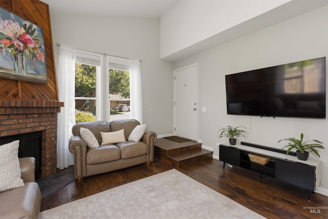 6835 W Freemont St, Boise, ID 83704 - living room with a fireplace, wood finished floors, and high vaulted ceiling