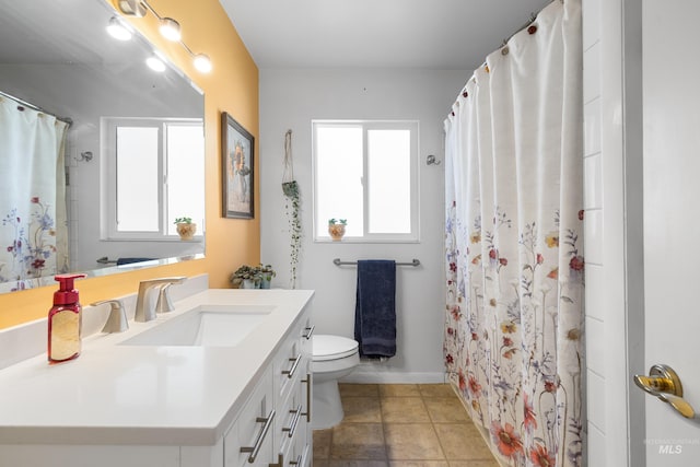 bathroom featuring a shower with shower curtain, toilet, tile patterned flooring, and vanity