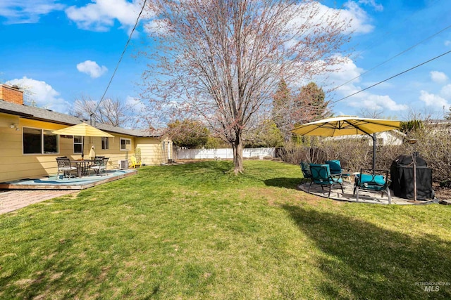 view of yard featuring a patio and fence private yard