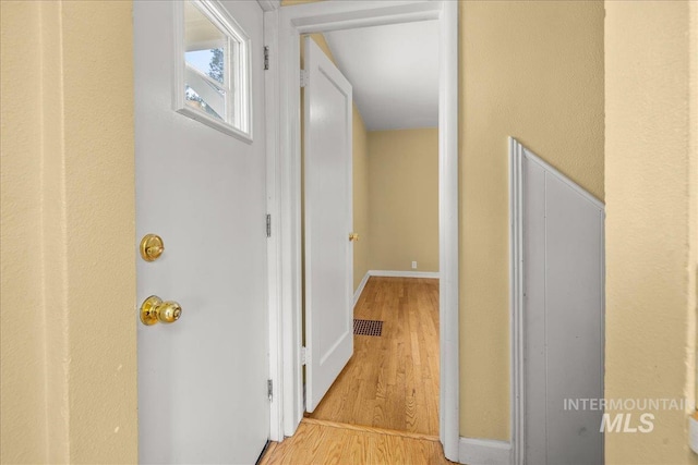 3205 W Crescent Rim Dr, Boise, ID 83706 - corridor featuring light wood finished floors and baseboards
