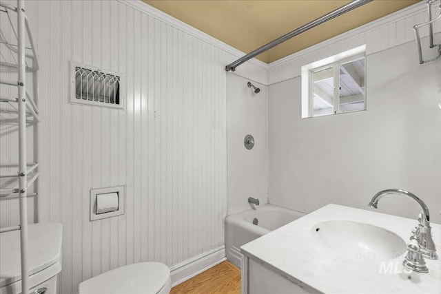 3205 W Crescent Rim Dr, Boise, ID 83706 - full bath featuring toilet, crown molding, bathing tub / shower combination, vanity, and wood finished floors