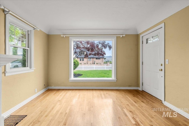 3205 W Crescent Rim Dr, Boise, ID 83706 - entrance foyer with baseboards and light wood-type flooring