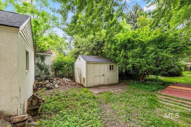 3205 W Crescent Rim Dr, Boise, ID 83706 - view of yard featuring a shed and an outbuilding