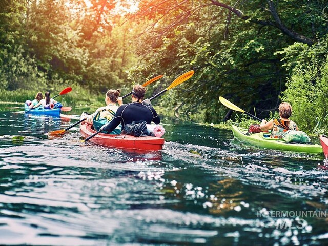 view of community with a water view