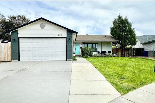 535 Seasons Ct, Nampa, ID 83686 - ranch-style home featuring concrete driveway, brick siding, and an attached garage