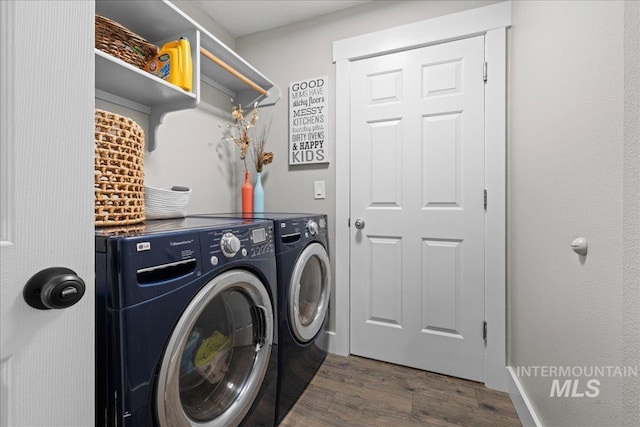 535 Seasons Ct, Nampa, ID 83686 - laundry area featuring separate washer and dryer and dark wood finished floors
