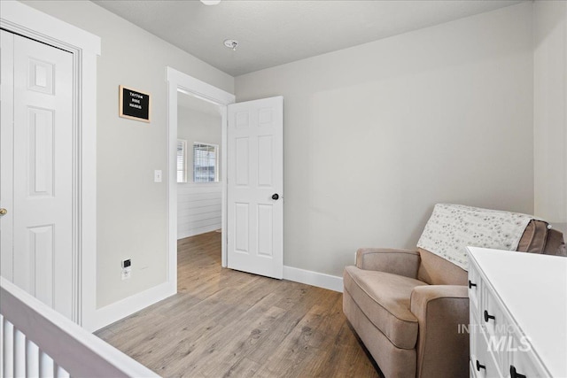 535 Seasons Ct, Nampa, ID 83686 - sitting room with baseboards and light wood finished floors