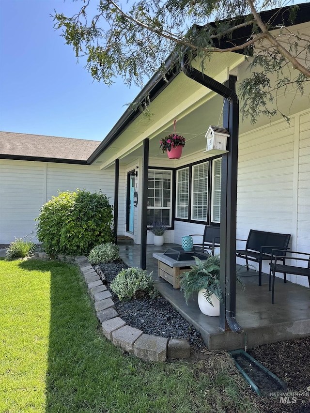 535 Seasons Ct, Nampa, ID 83686 - entrance to property featuring a lawn and covered porch
