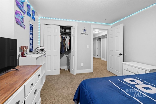 535 Seasons Ct, Nampa, ID 83686 - bedroom with light colored carpet, a closet, and baseboards