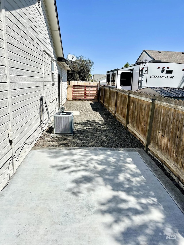 535 Seasons Ct, Nampa, ID 83686 - fenced backyard featuring cooling unit and a patio area