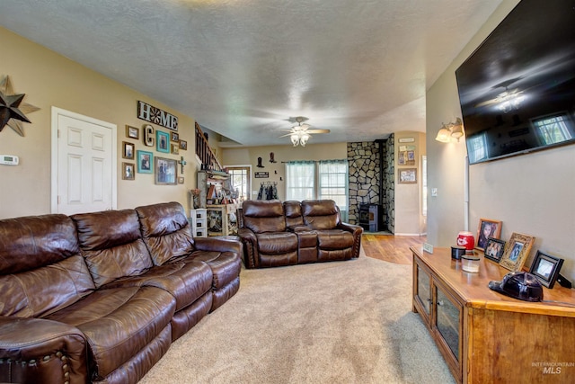 28284 Tudie Ln, Parma, ID 83660 - living room with a ceiling fan, carpet floors, and a textured ceiling