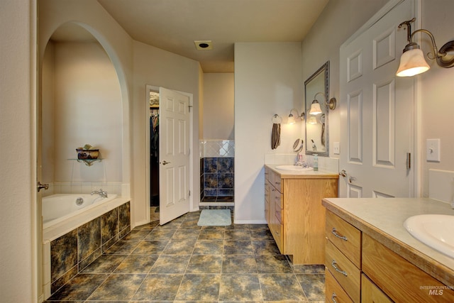 28284 Tudie Ln, Parma, ID 83660 - bathroom with two vanities, a garden tub, and a sink