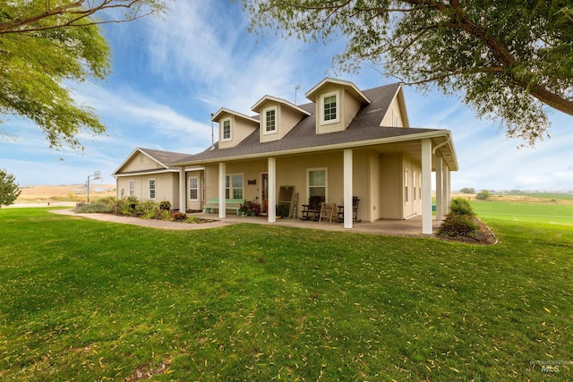 28284 Tudie Ln, Parma, ID 83660 - rear view of house with a patio area and a yard