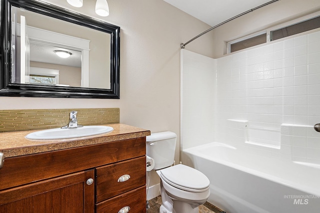 full bath featuring backsplash, shower / bath combination, vanity, and toilet