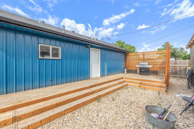 205 N Fouch, Parma, ID 83660 - back of property featuring a wooden deck and board and batten siding
