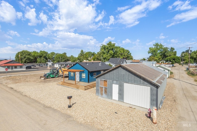 205 N Fouch, Parma, ID 83660 - view of front facade with a wooden deck