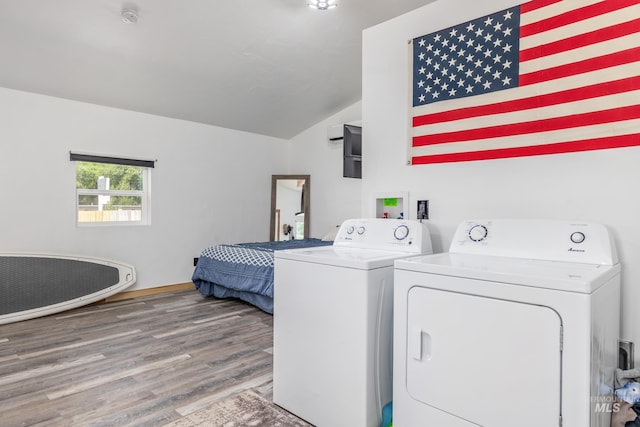 205 N Fouch, Parma, ID 83660 - laundry area featuring washer and dryer and wood finished floors
