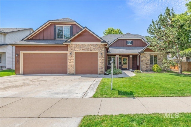 2895 E Shadowwolf Dr, Eagle, ID 83616 - view of front of property featuring driveway, board and batten siding, and a garage