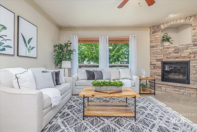 2895 E Shadowwolf Dr, Eagle, ID 83616 - carpeted living room with ceiling fan, a fireplace, and ornamental molding
