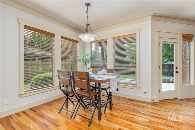 2895 E Shadowwolf Dr, Eagle, ID 83616 - dining room with plenty of natural light and light wood-style floors