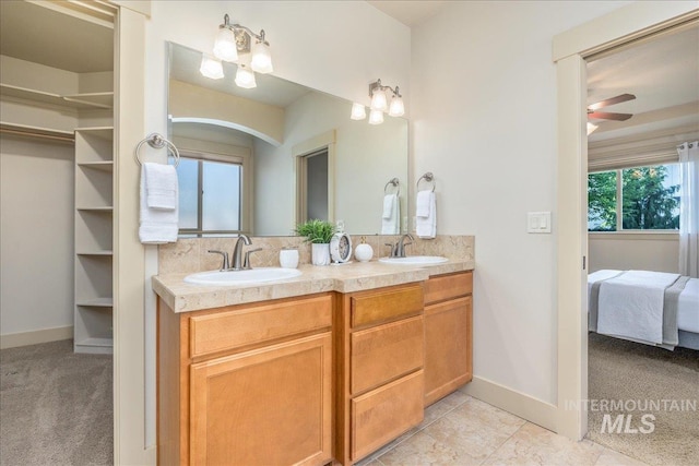2895 E Shadowwolf Dr, Eagle, ID 83616 - ensuite bathroom featuring double vanity and ceiling fan