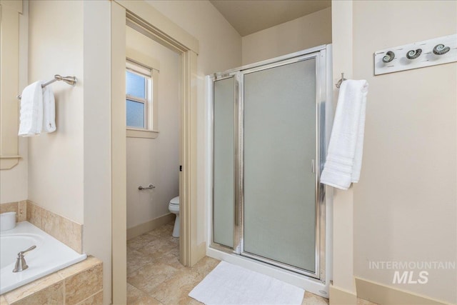 2895 E Shadowwolf Dr, Eagle, ID 83616 - full bathroom featuring a shower stall and a bath