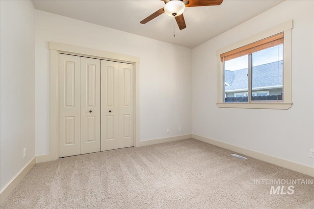 2895 E Shadowwolf Dr, Eagle, ID 83616 - unfurnished bedroom featuring carpet, a closet, and ceiling fan