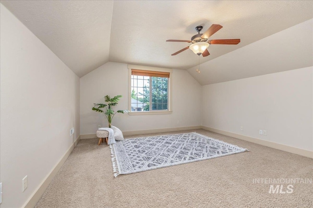 2895 E Shadowwolf Dr, Eagle, ID 83616 - bonus room featuring carpet, vaulted ceiling, ceiling fan, and a textured ceiling