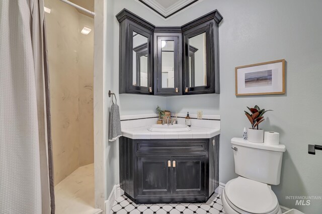 930 W Wanda Ln, Heyburn, ID 83336 - bathroom featuring toilet, a shower with shower curtain, and vanity