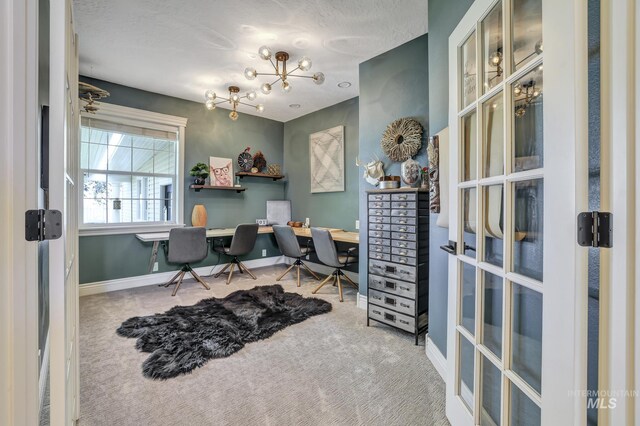 930 W Wanda Ln, Heyburn, ID 83336 - carpeted office with baseboards, french doors, and built in study area