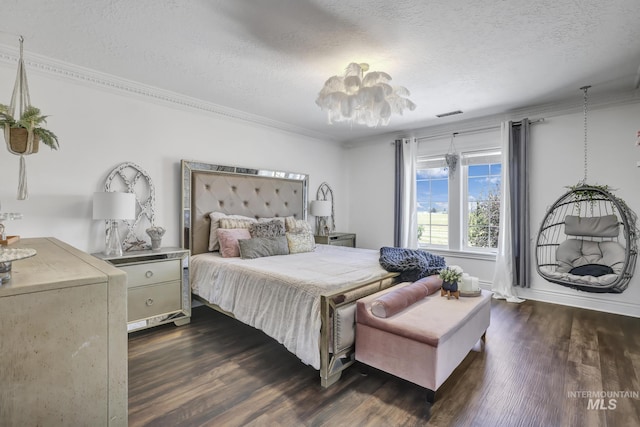 930 W Wanda Ln, Heyburn, ID 83336 - bedroom with dark wood-style flooring, a textured ceiling, crown molding, and baseboards