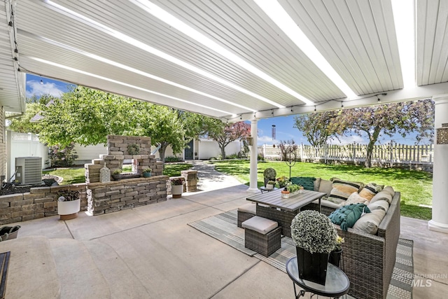 930 W Wanda Ln, Heyburn, ID 83336 - view of patio featuring central AC and an outdoor hangout area