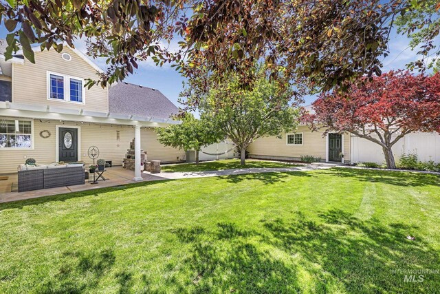 930 W Wanda Ln, Heyburn, ID 83336 - view of yard featuring an outdoor living space and a patio area