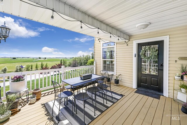 930 W Wanda Ln, Heyburn, ID 83336 - wooden deck with outdoor dining area