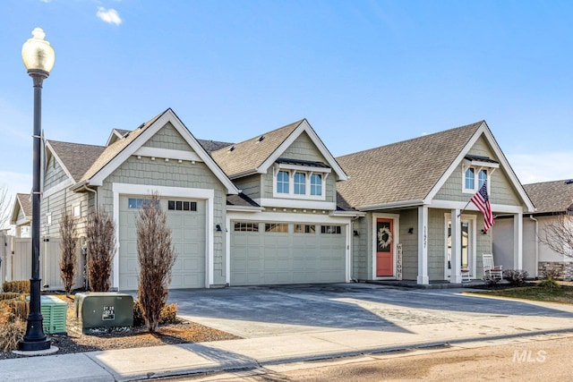 craftsman inspired home with a garage