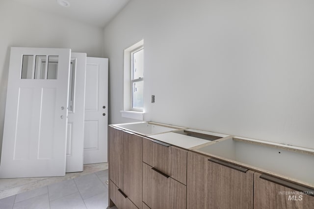 916 23rd Ave E, Jerome, ID 83328 - laundry area featuring light tile patterned floors