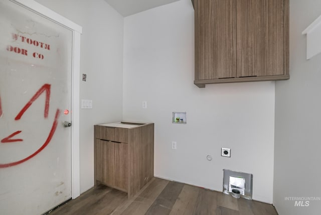 916 23rd Ave E, Jerome, ID 83328 - laundry room with cabinet space, washer hookup, wood finished floors, and hookup for an electric dryer