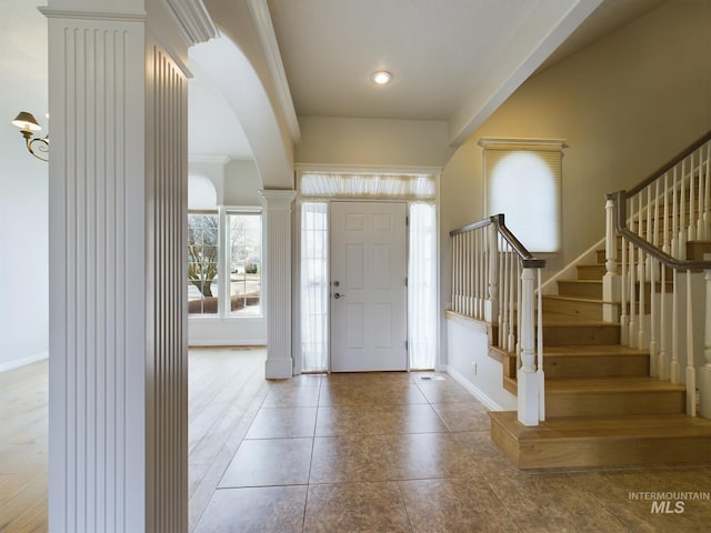 entryway with stairway, baseboards, decorative columns, recessed lighting, and tile patterned floors