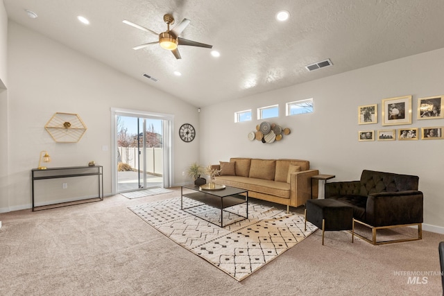 living room with visible vents, lofted ceiling, recessed lighting, a textured ceiling, and carpet flooring