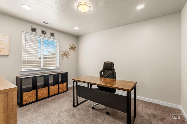 carpeted home office with recessed lighting, baseboards, visible vents, and a textured ceiling