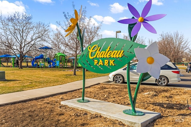 exterior space with playground community and a yard