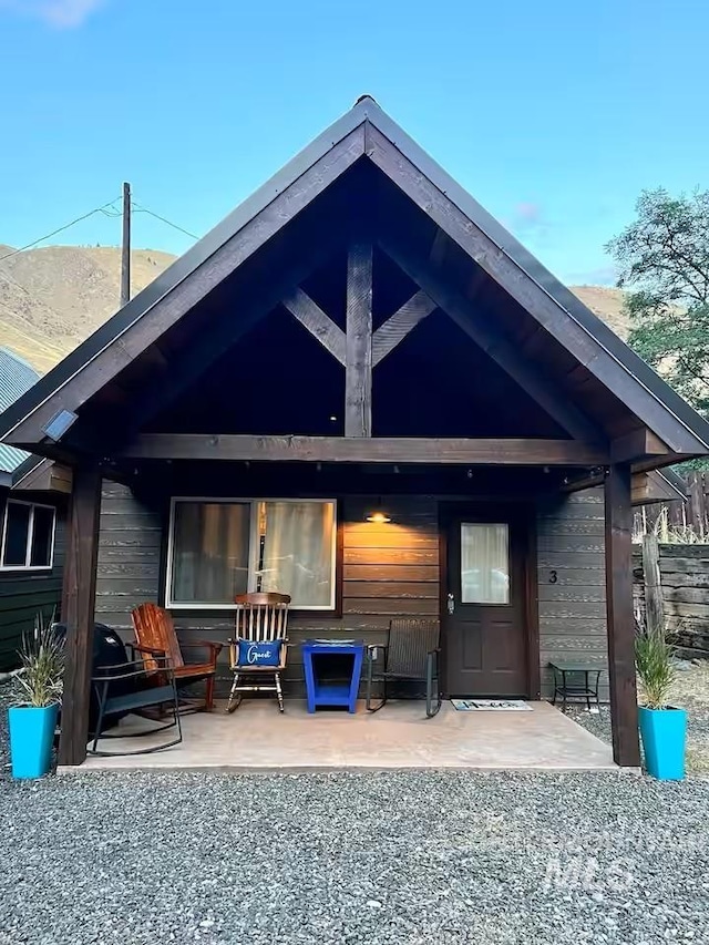 rear view of house with a patio